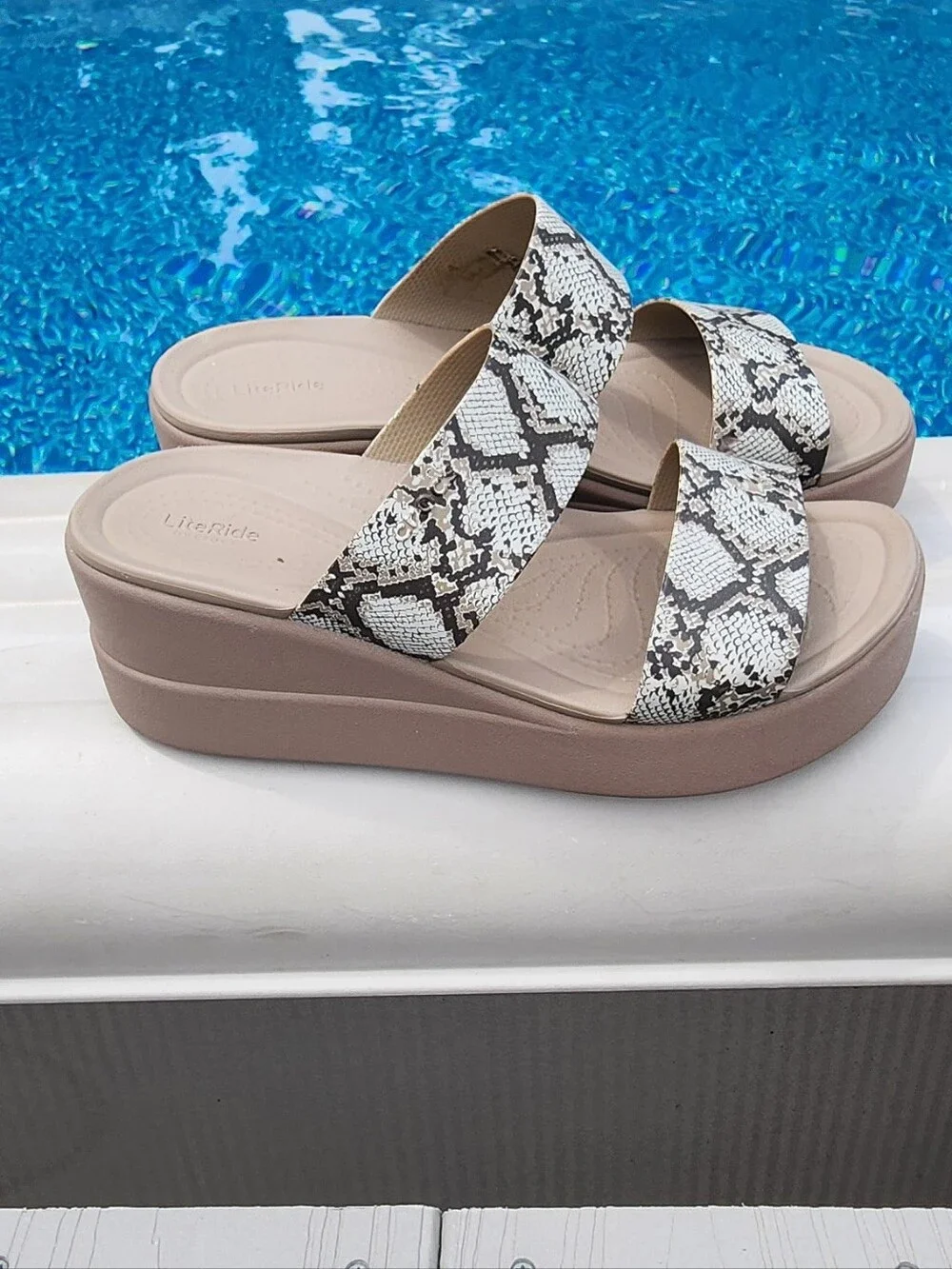 Crocs Brooklyn Mid Wedge sandals in a snakeskin print.  PRICED TO SELL
